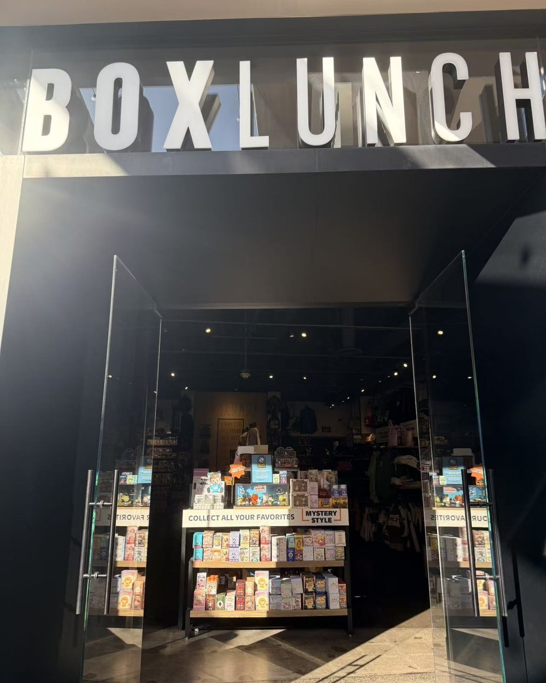 Designer-toy blind boxes on display at a BoxLunch store — a U.S. key-account retailer